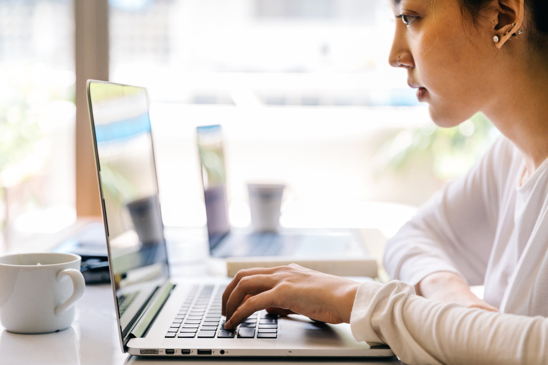 A woman working on a laptop